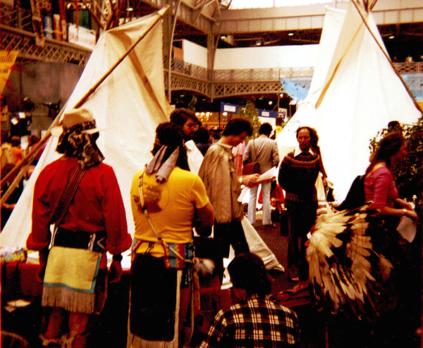 Tepees and their inhabitants at the festival, 1980 Olympia